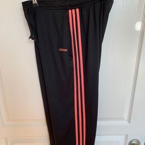 Black Adidas athletic pants with pink 3-stripes